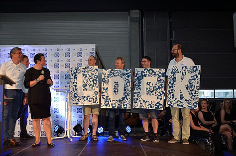 LockDrives 175 Years of Lock Celebration Employee Group Photo Summer Celebration Stage