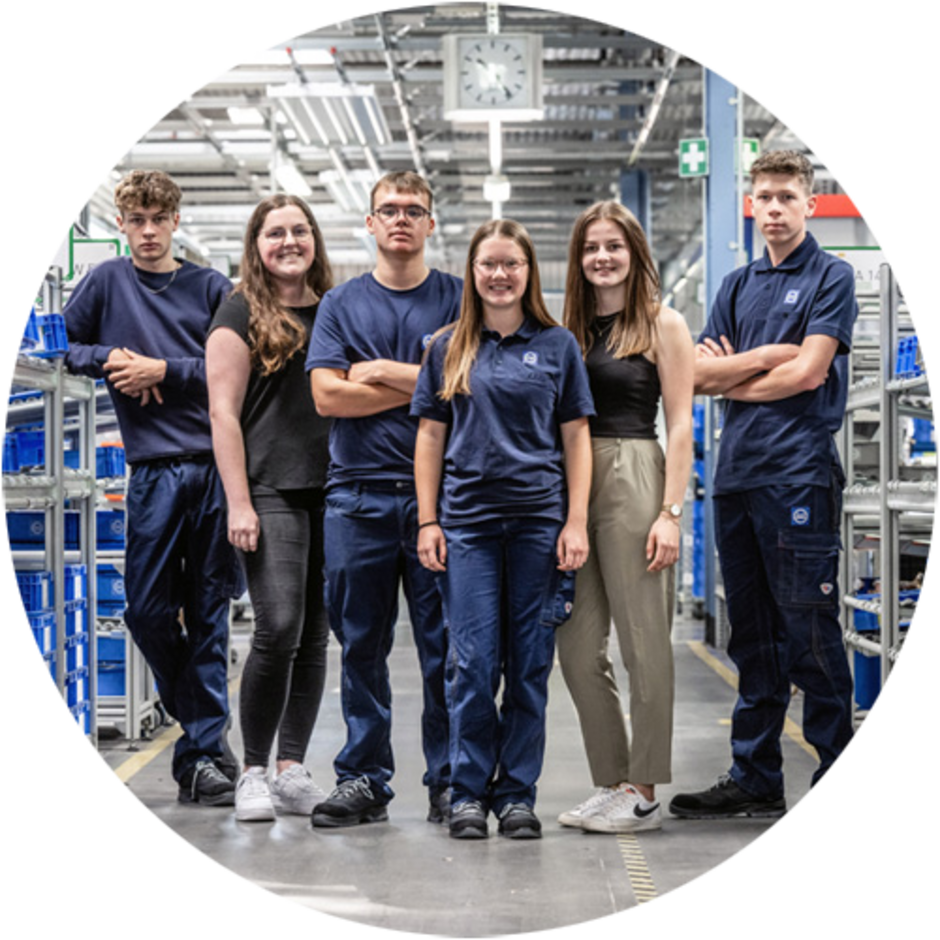 Lock Drives Reference Trainees in the factory hall